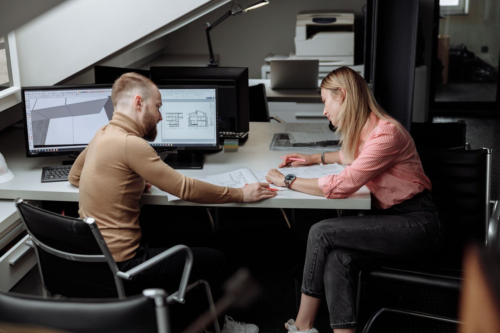 Business professionals analyzing Marvell Technology AI stock and data center architecture diagram